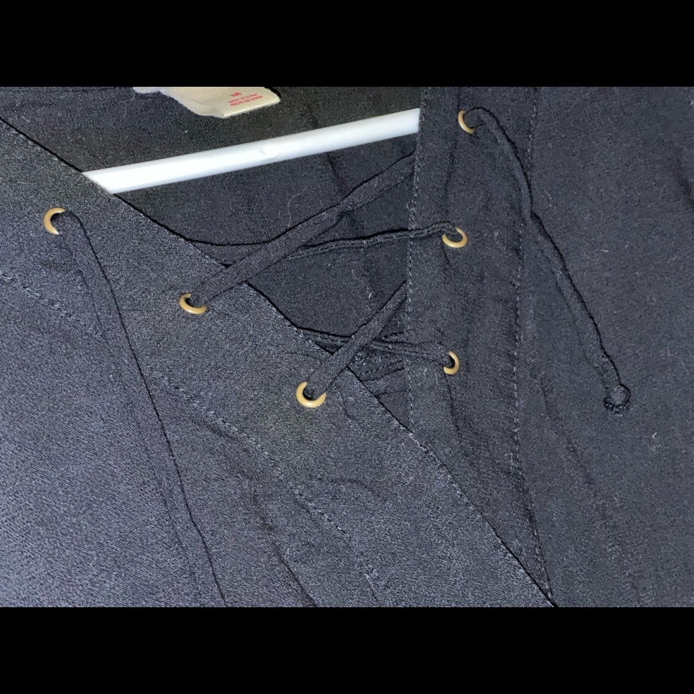 Black long sleeve shirt with lacing in front
